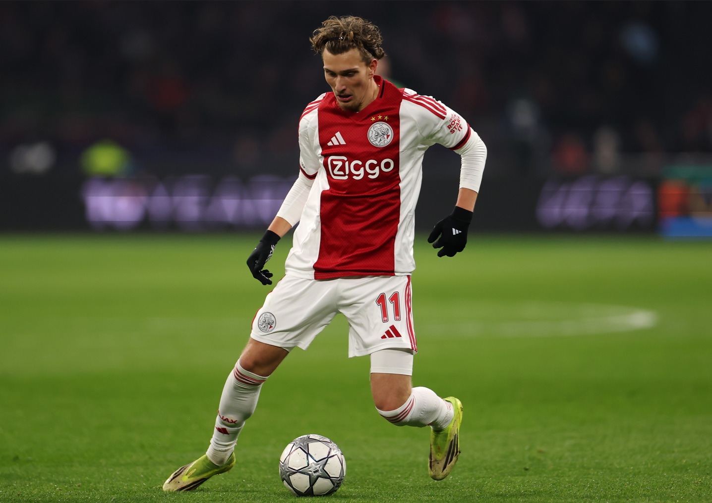 Ajax winger Mika Godts has been advised not to join Liverpool at this stage of his career