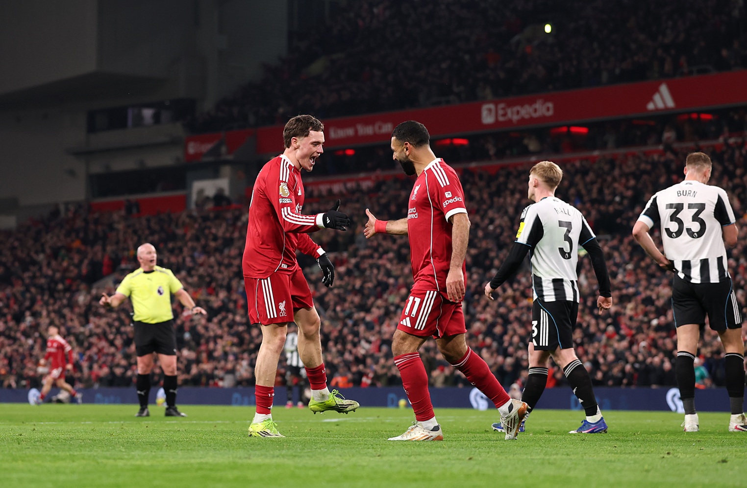 Florian Wirtz and Mo Salah celebrate during Liverpool's win over Newcastle