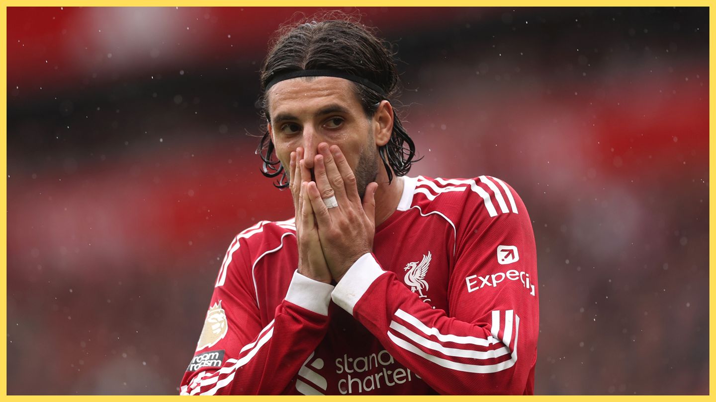 Dominik Szoboszlai covers his mouth with both hands in shock during Liverpool game.