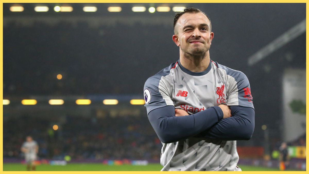 Xherdan Shaqiri of Liverpool celebrates after scoring his team's third goal during the Premier League match between Burnley FC and Liverpool FC at Turf Moor on December 5, 2018 in Burnley