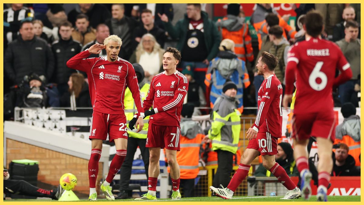 Hugo Ekitike of Liverpool celebrates scoring his team's second goal with teammates Florian Wirtz and Alexis Mac Allister during the Premier League match between Liverpool and Newcastle United
