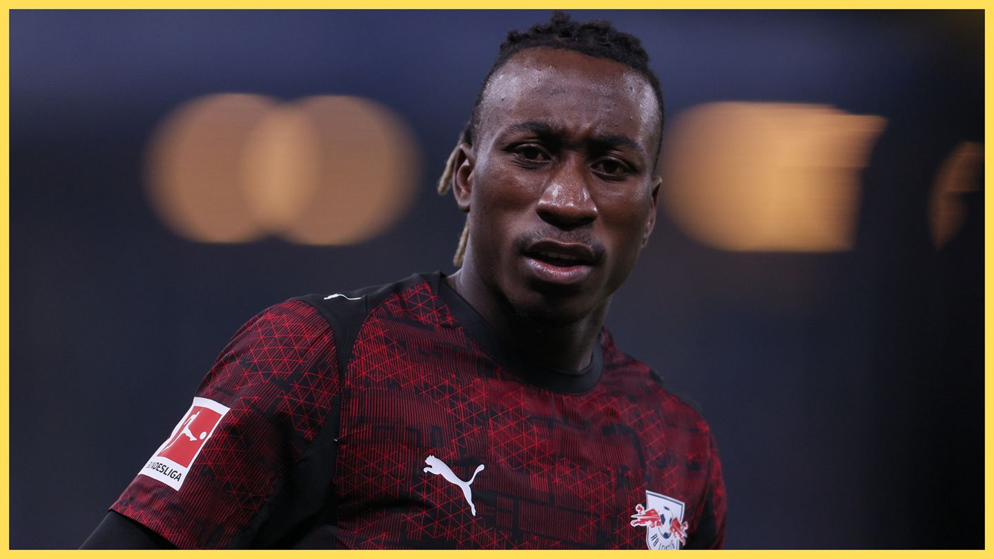 Yan Diomande frowns during RB Leipzig game.