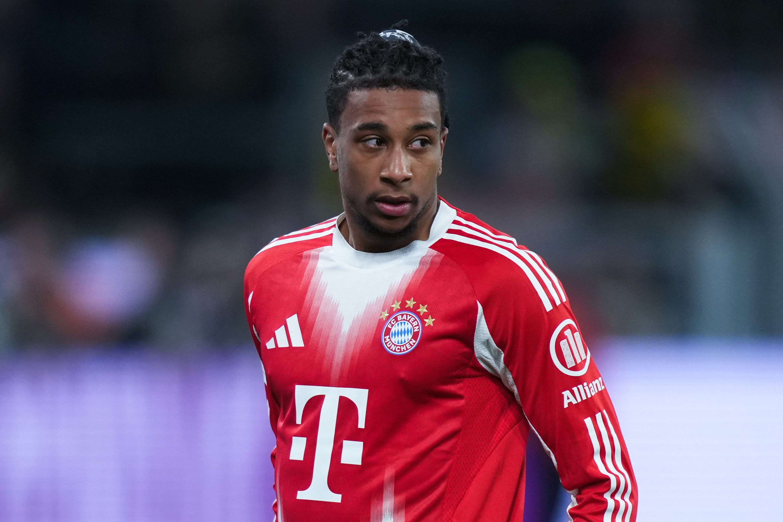 Michael Olise looks on during Bayern Munich game.