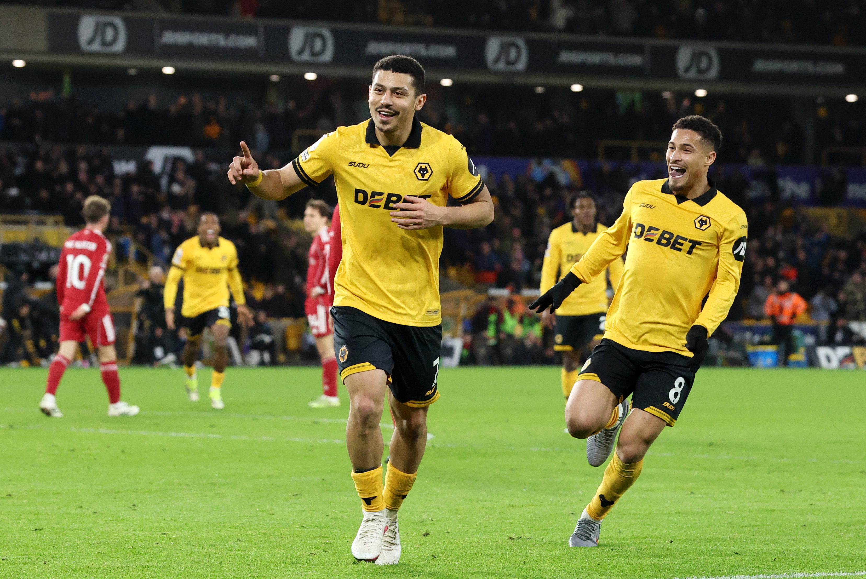 Andre Trindade celebrates his last-minute winner for Wolves against Liverpool on Tuesday