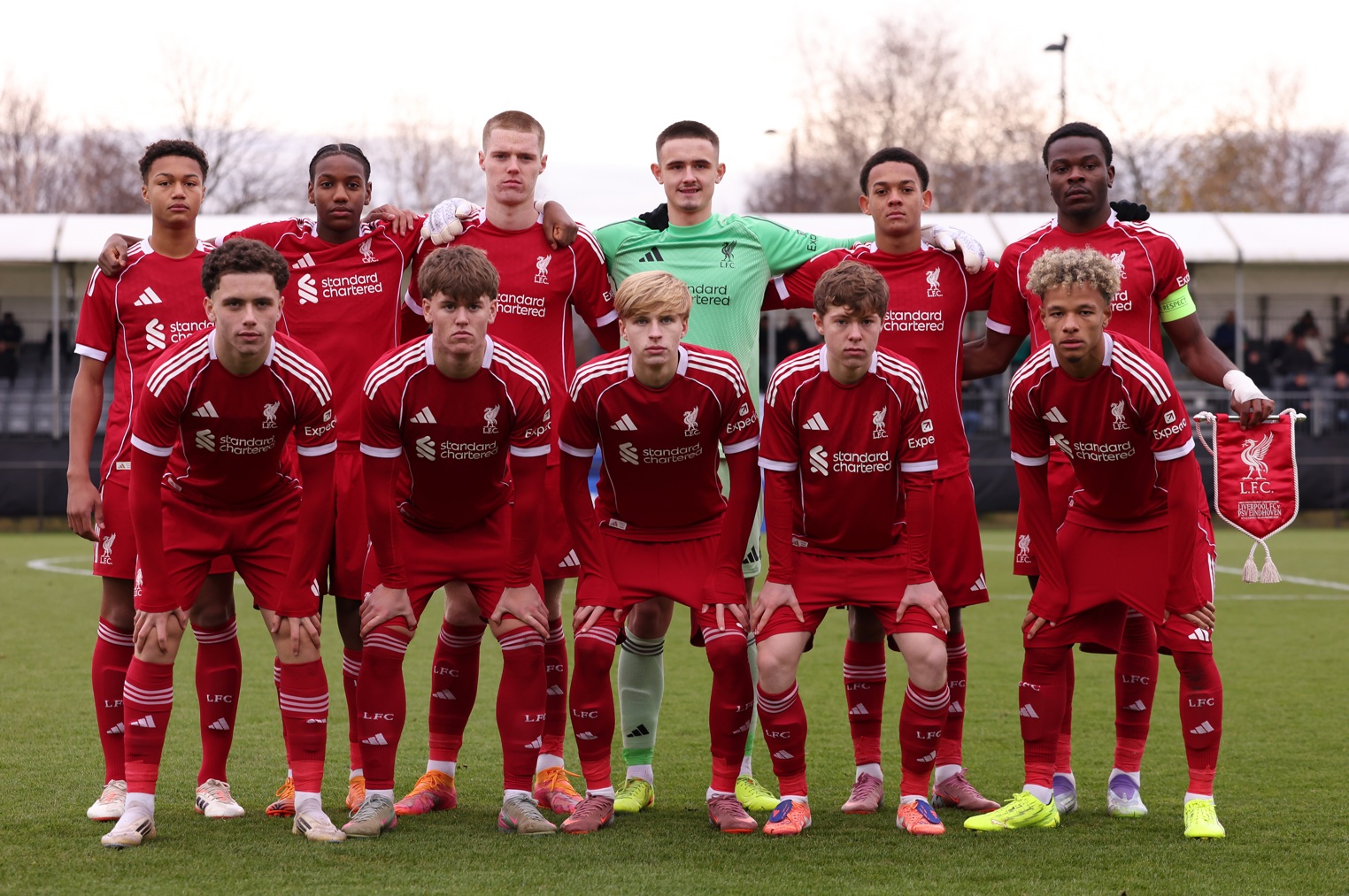 Liverpool under-19s line up for a team photo before a UEFA Youth League game