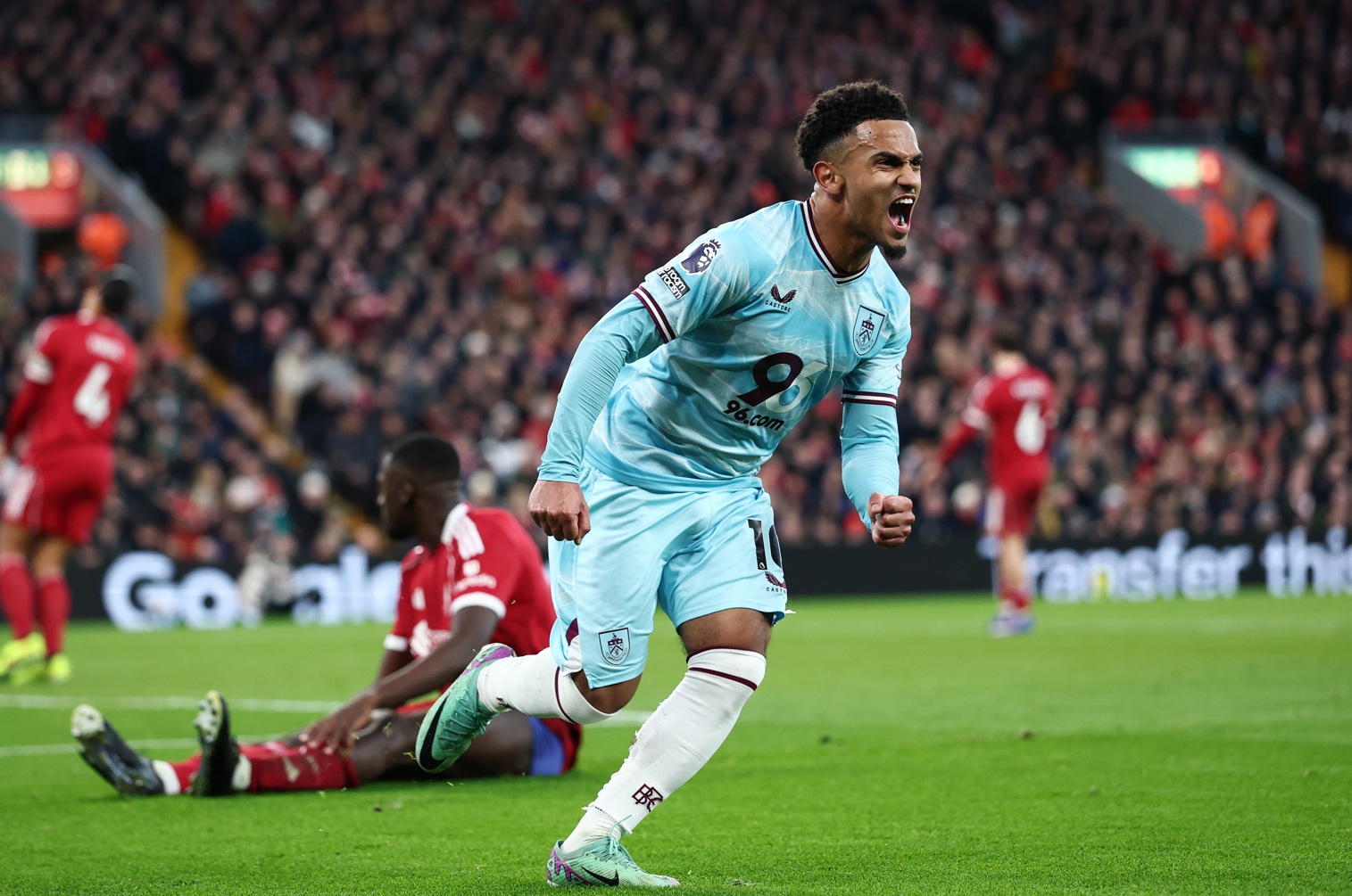 Marcus Edwards celebrates scoring against Liverpool at Anfield