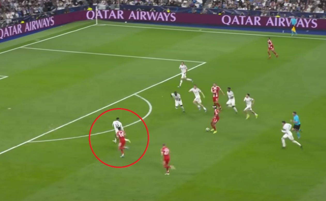 Serge Gnabry plays a pass as Luis Diaz runs around Trent Alexander-Arnold.