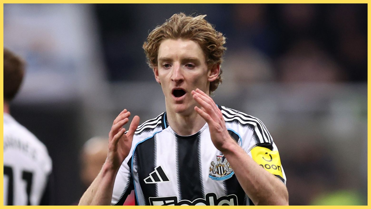 Anthony Gordon holds out his hands in shock during Newcastle game.