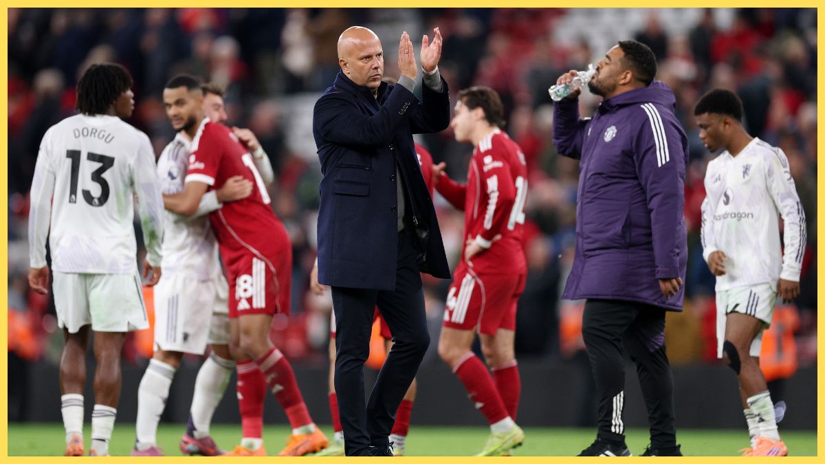 Arne Slot, Manager of Liverpool, applauds the fans following defeat in the Premier League match between Liverpool and Manchester United at Anfield