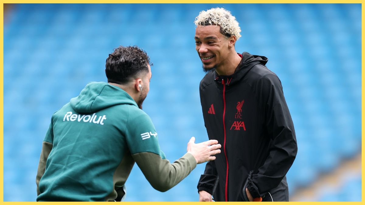 Hugo Ekitike of Liverpool speaks with Rayan Cherki of Manchester City as they inspect the pitch prior to the Emirates FA Cup Quarter Final match between Manchester City and Liverpool
