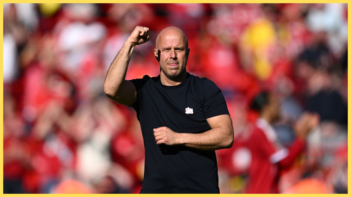 Arne Slot, Manager of Liverpool, celebrates following the team's victory during the Premier League match between Liverpool and Crystal Palace at Anfield