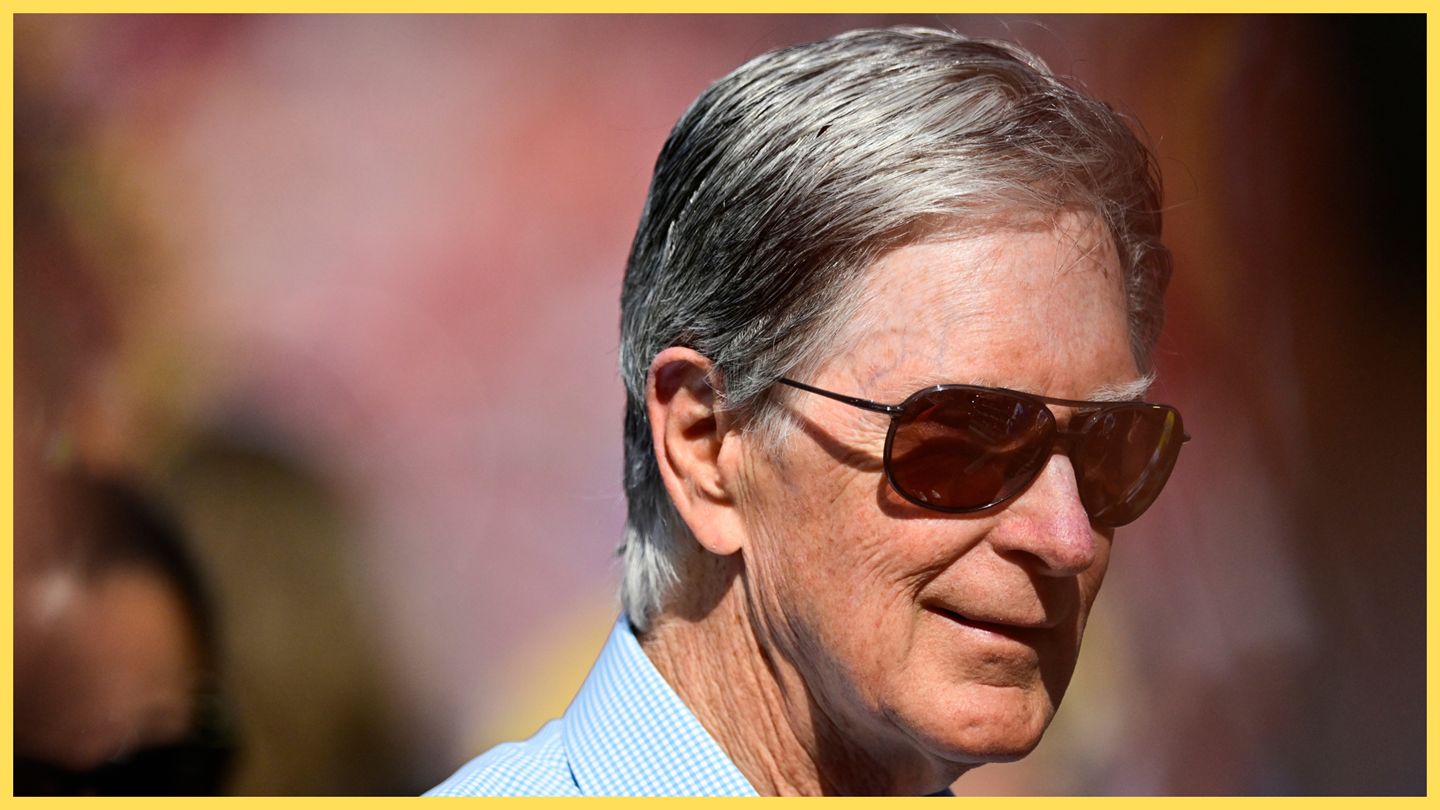 Liverpool's principal owner John W Henry smiles ahead of Red Sox game.