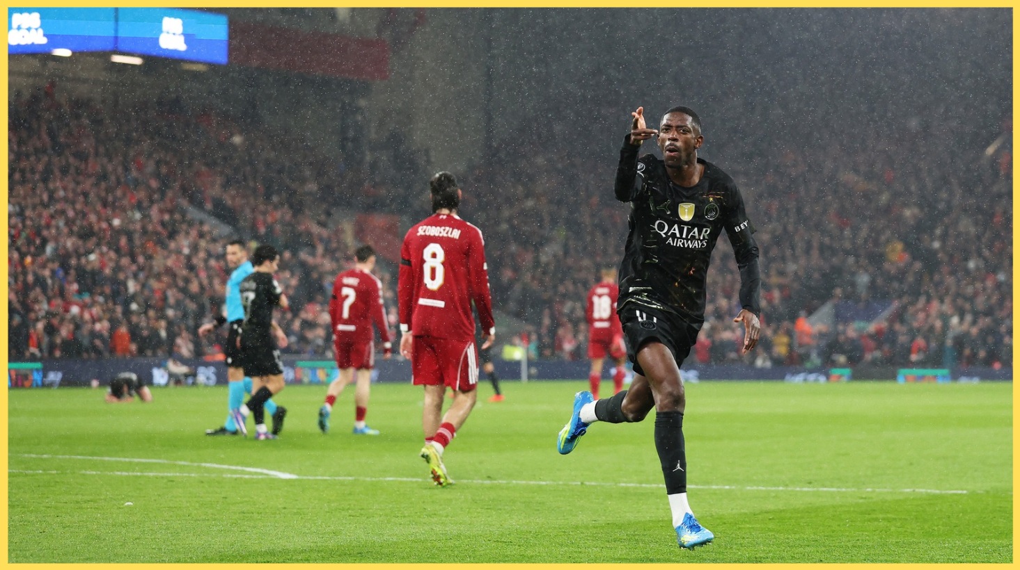 Ousmane Dembele celebrates scoring against Liverpool at Anfield