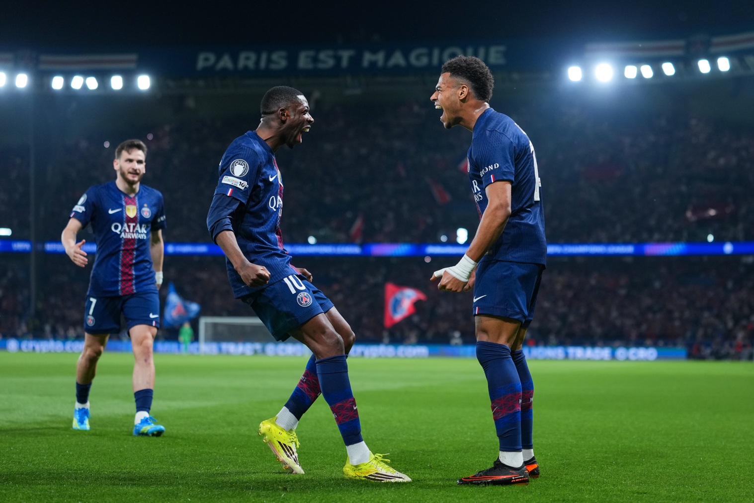 Ousmane Dembele and Desire Doue celebrate a goal for PSG
