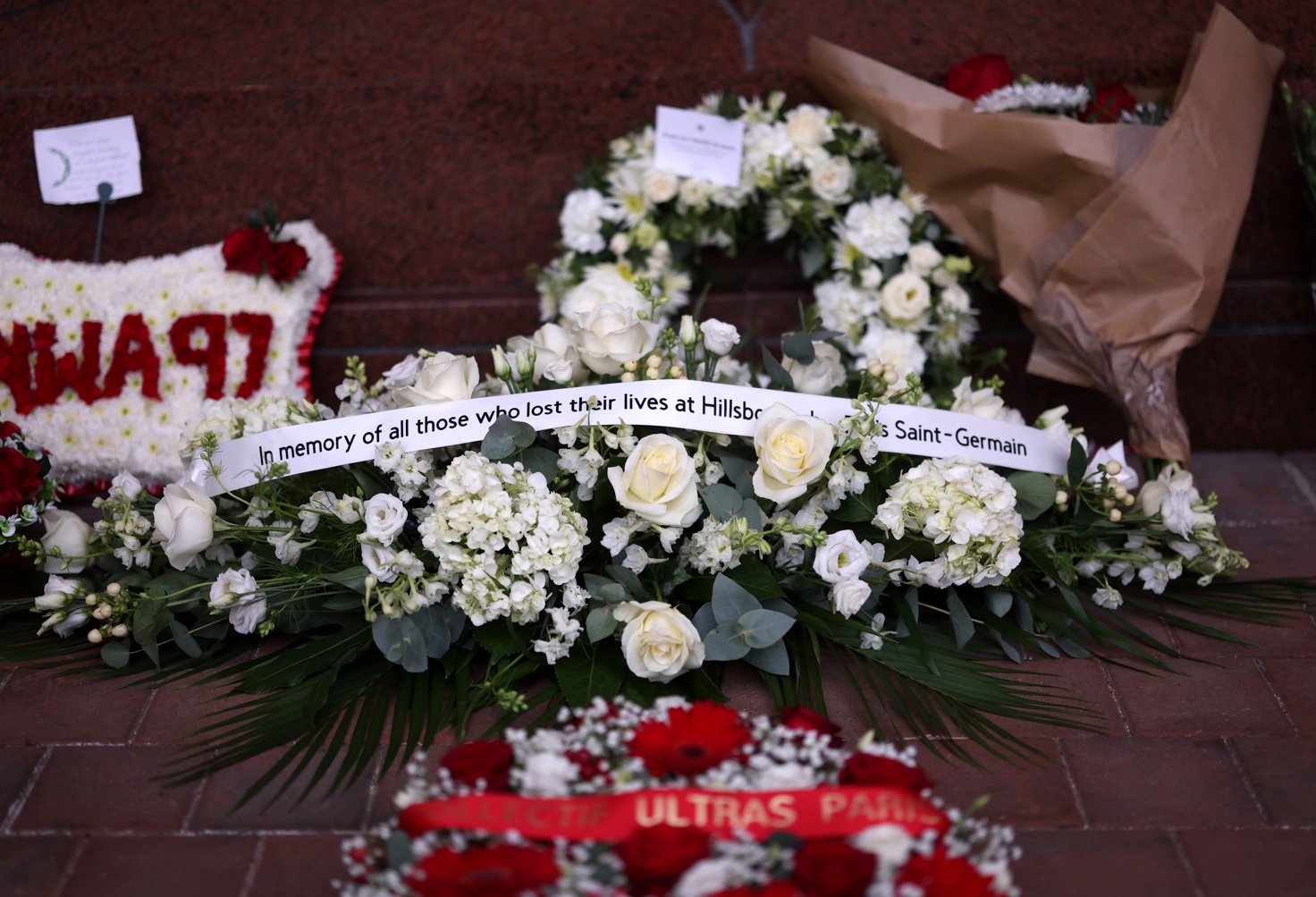 PSG players and staff laid a wreath of remembrance at Anfield in memory of the 97 Liverpool fans who were unlawfully killed in the Hillsborough disaster