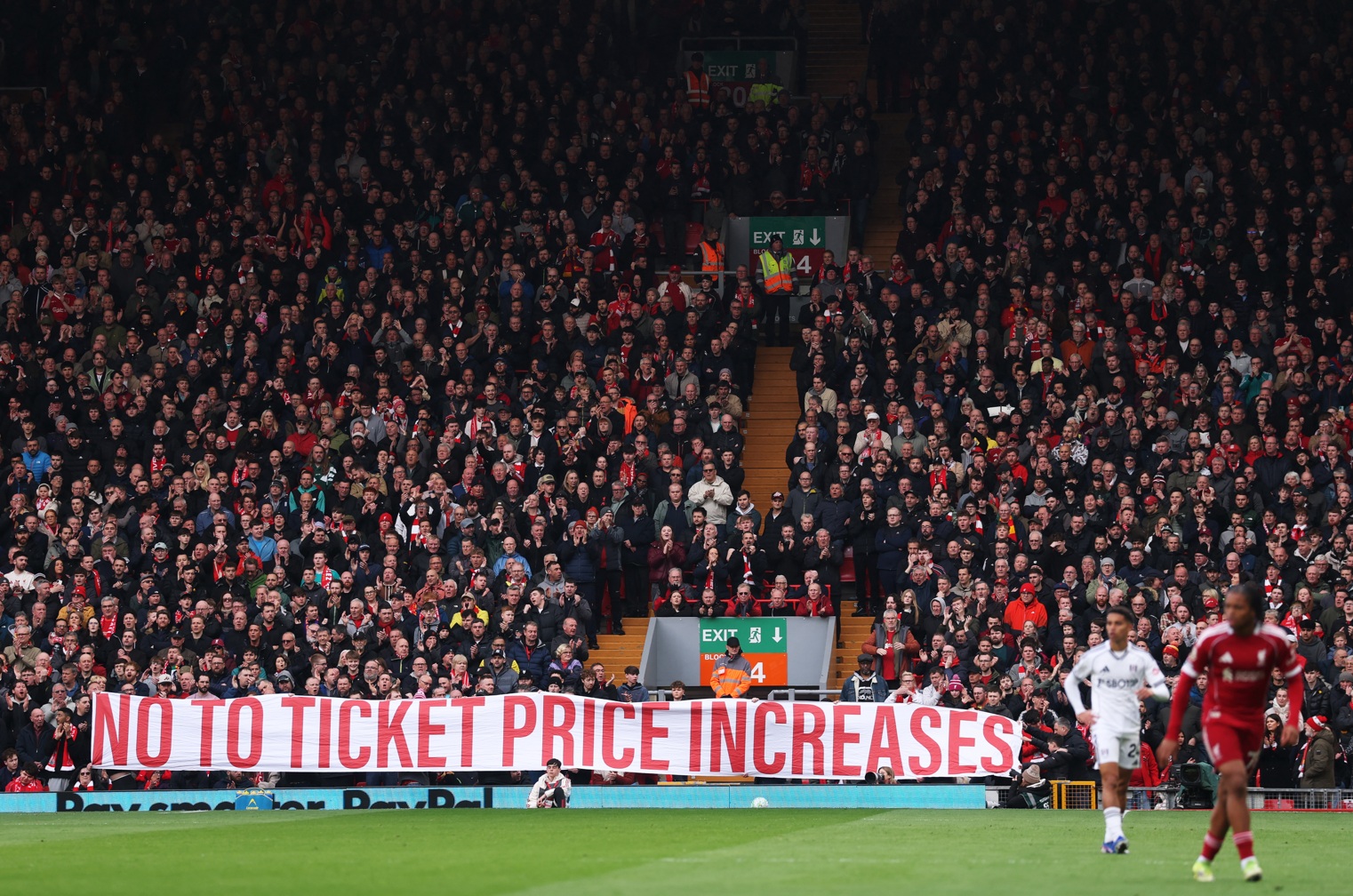 Liverpool fans display a banner objecting to ticket price increases at Anfield