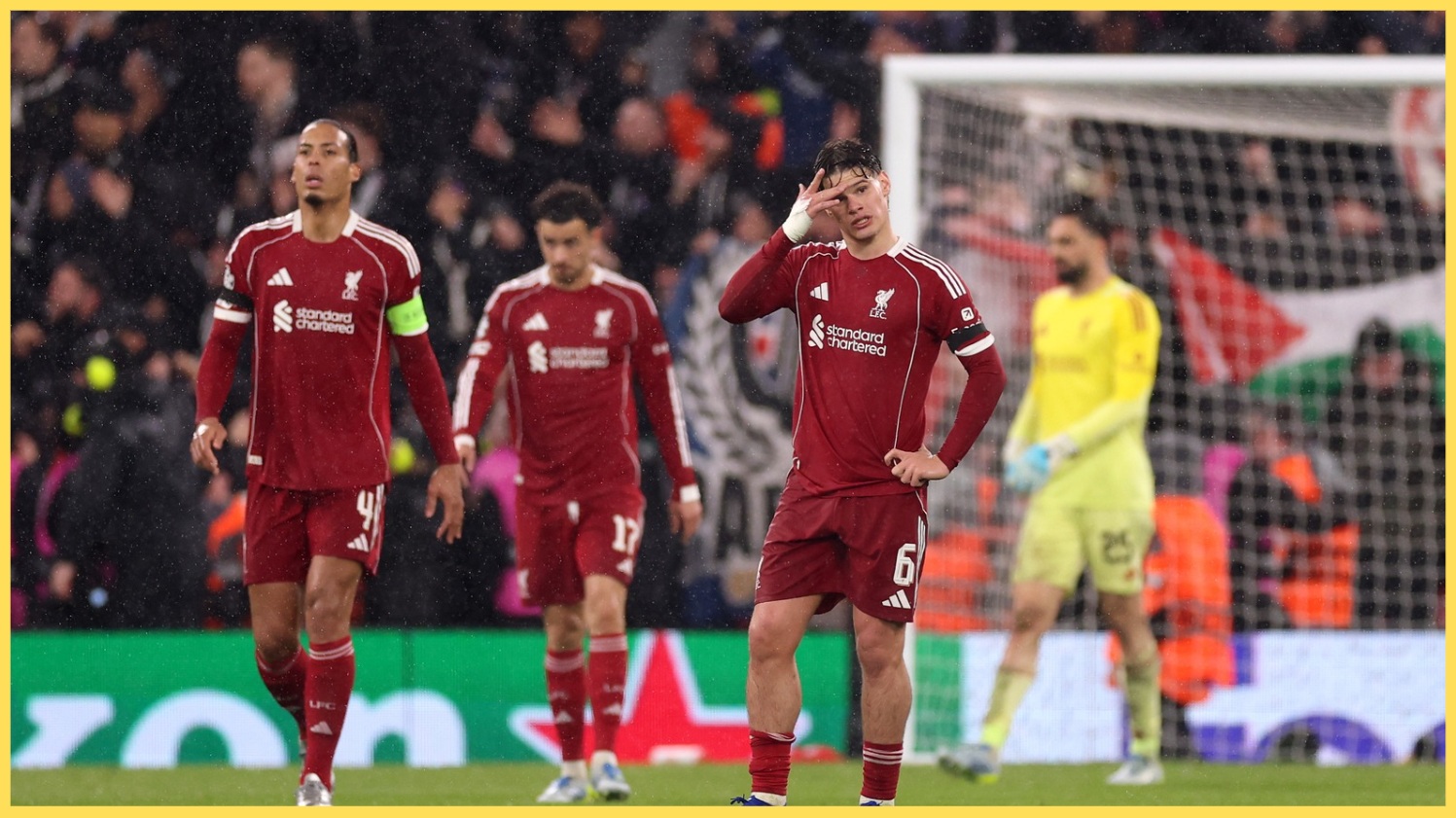 Liverpool's players look dejected after Ousmane Dembele's goal at Anfield