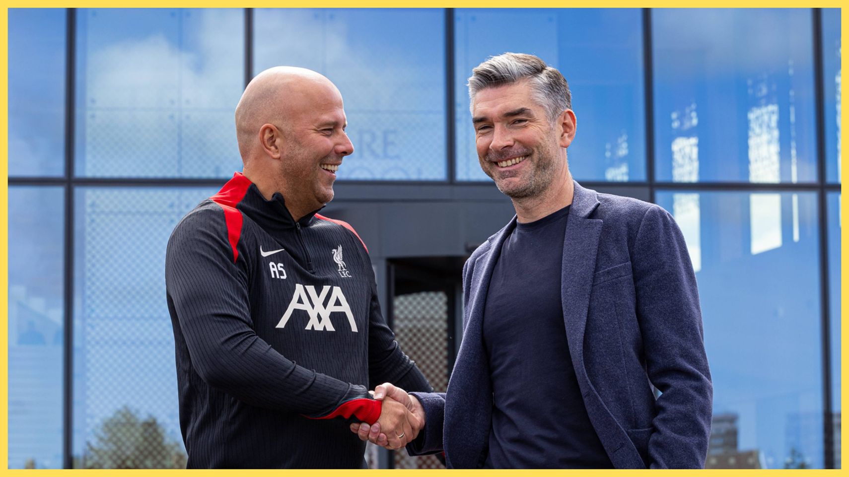 Richard Hughes shakes hands with Liverpool head coach Arne Slot.