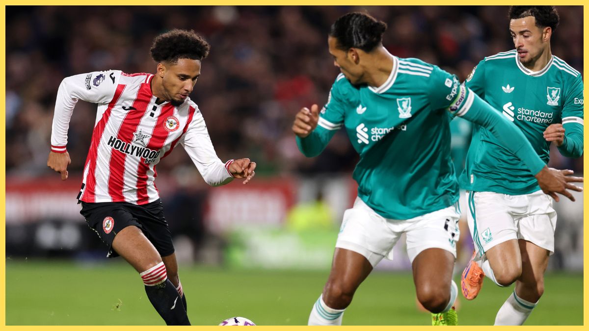 Kevin Schade of Brentford gets past Curtis Jones and Virgil van Dijk of Liverpool during the Premier League match between Brentford and Liverpool at Gtech Community Stadium