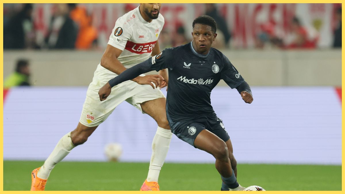 Givairo Read of Feyenoord runs with the ball whilst under pressure from Josha Vagnoman of VfB Stuttgart during the UEFA Europa League 2025/26 League Phase MD4 match between VfB Stuttgart and Feyenoord at Stuttgart Arena