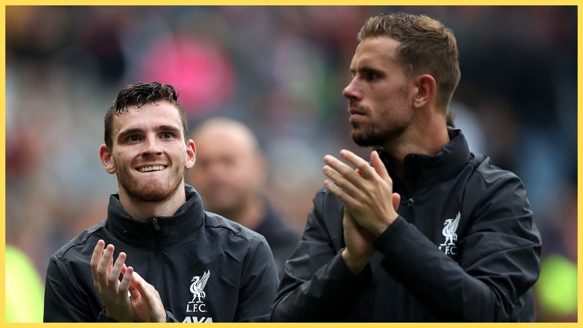 Andy Robertson of Liverpool (L) and Jordan Henderson of Liverpool applaud fans following the Pre-Season Friendly match between Liverpool FC and SSC Napoli at Murrayfield