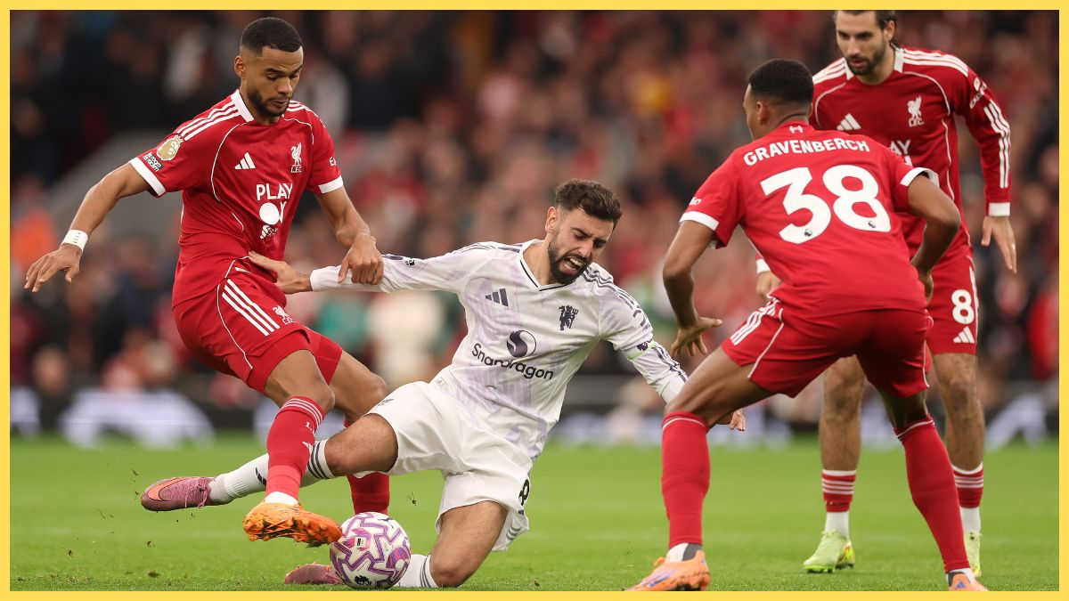 Bruno Fernandes of Manchester United is challenged by Cody Gakpo of Liverpool during the Premier League match between Liverpool and Manchester United at Anfield