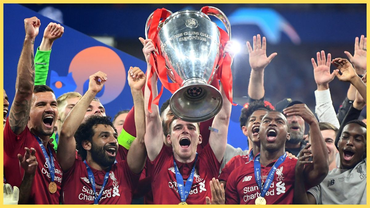 Andy Robertson of Liverpool lifts the Champions League Trophy after winning the UEFA Champions League Final between Tottenham Hotspur and Liverpool at Estadio Wanda Metropolitano