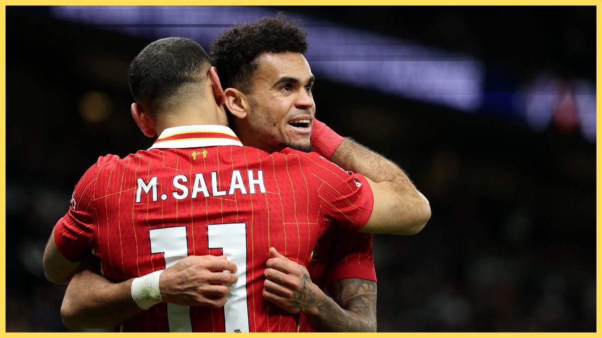 Luis Diaz of Liverpool celebrates scoring his sides sixth goal with team mate Mohamed Salah during the Premier League match between Tottenham Hotspur FC and Liverpool FC at Tottenham Hotspur Stadium