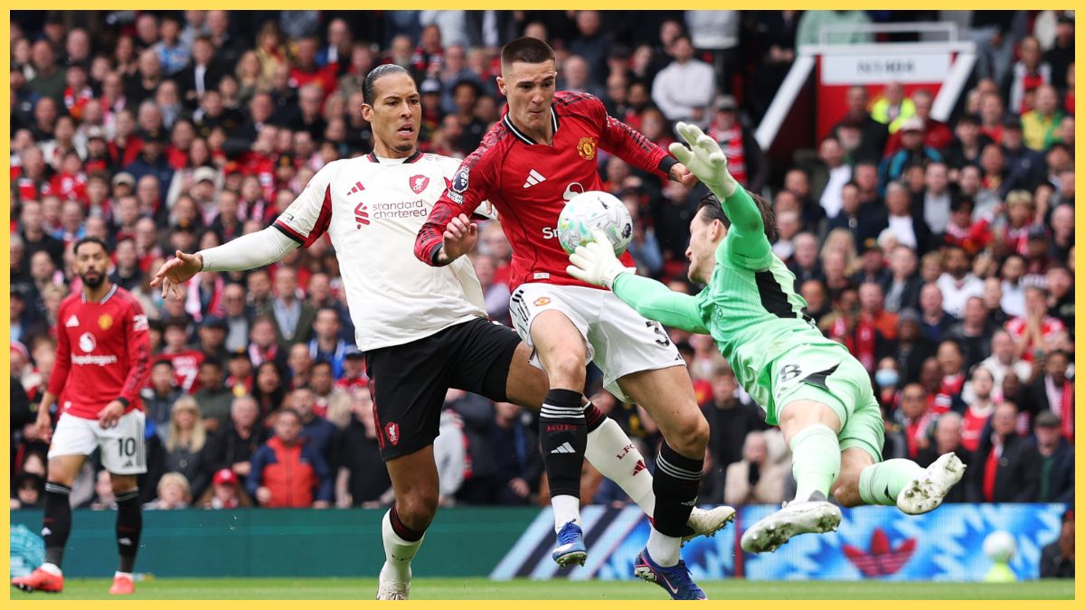 Benjamin Sesko of Manchester United scores his team's second goal, as Freddie Woodman of Liverpool fails to make the save during the Premier League match between Manchester United and Liverpool at Old Trafford
