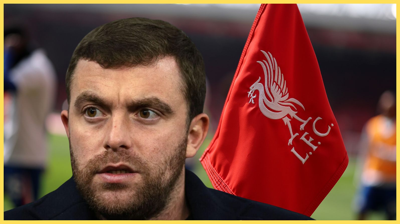 Fabrizio Romano looks on in front of Liverpool flag.