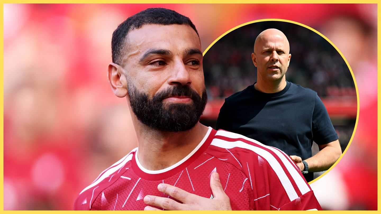 Liverpool winger Mo Salah holds his chest next to Arne Slot.