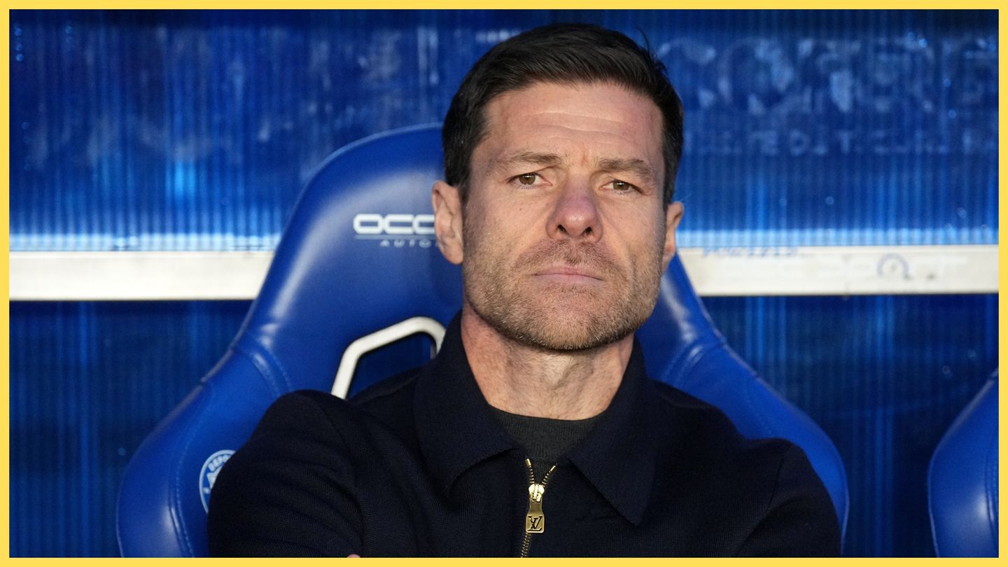 Xabi Alonso looks on from the bench.
