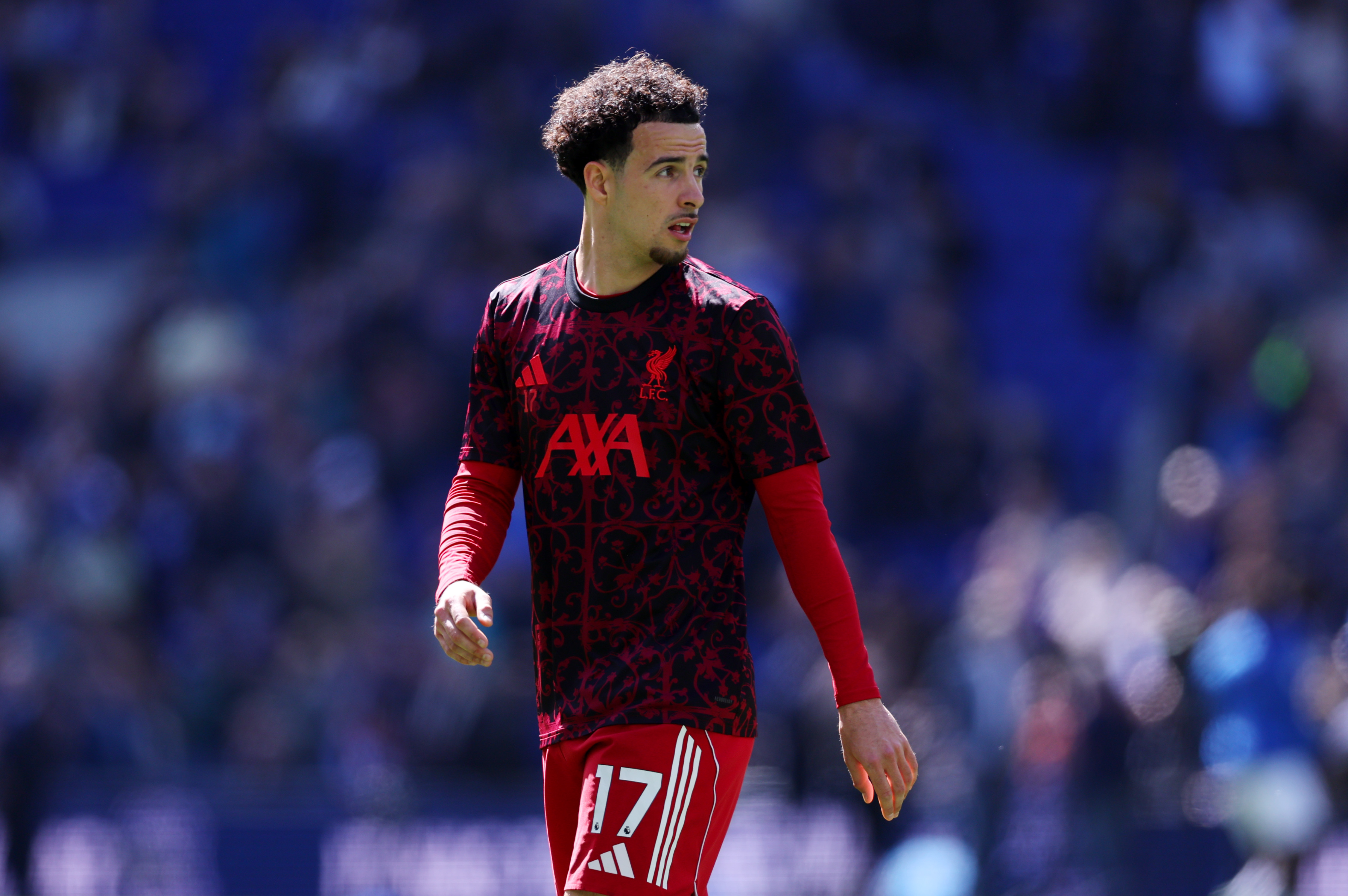 Curtis Jones pictured during the warmup prior to the Merseyside derby in April