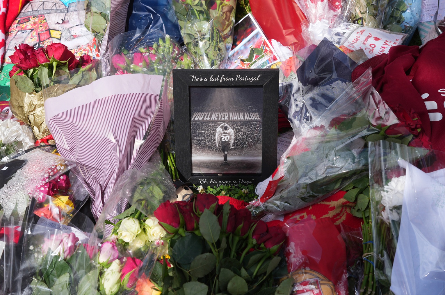 Floral and pictorial tributes to Diogo Jota were laid outside Anfield last July after his tragic death