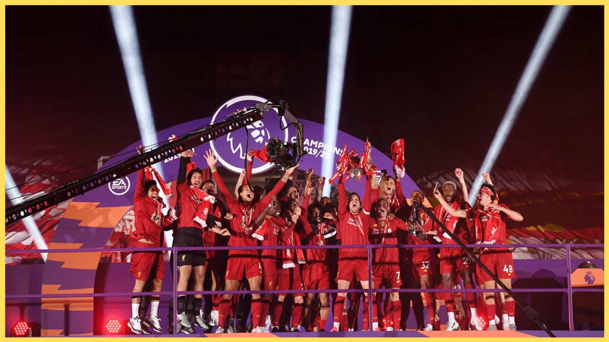Liverpool players celebrate winning the Premier League in 2020