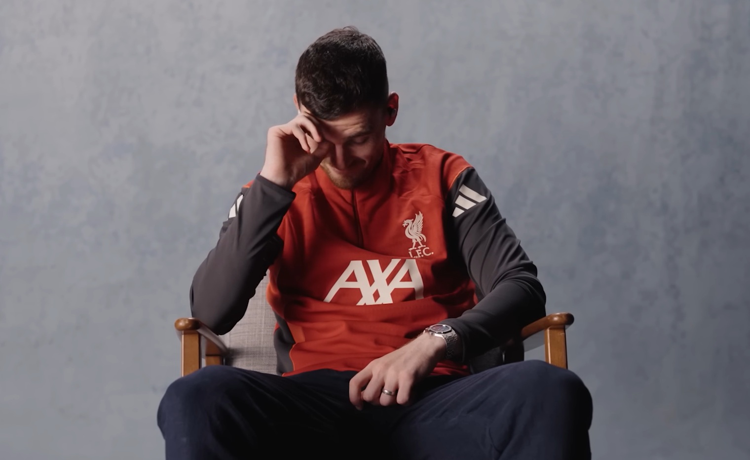 Andy Robertson fought back tears when reading messages from his wife and children