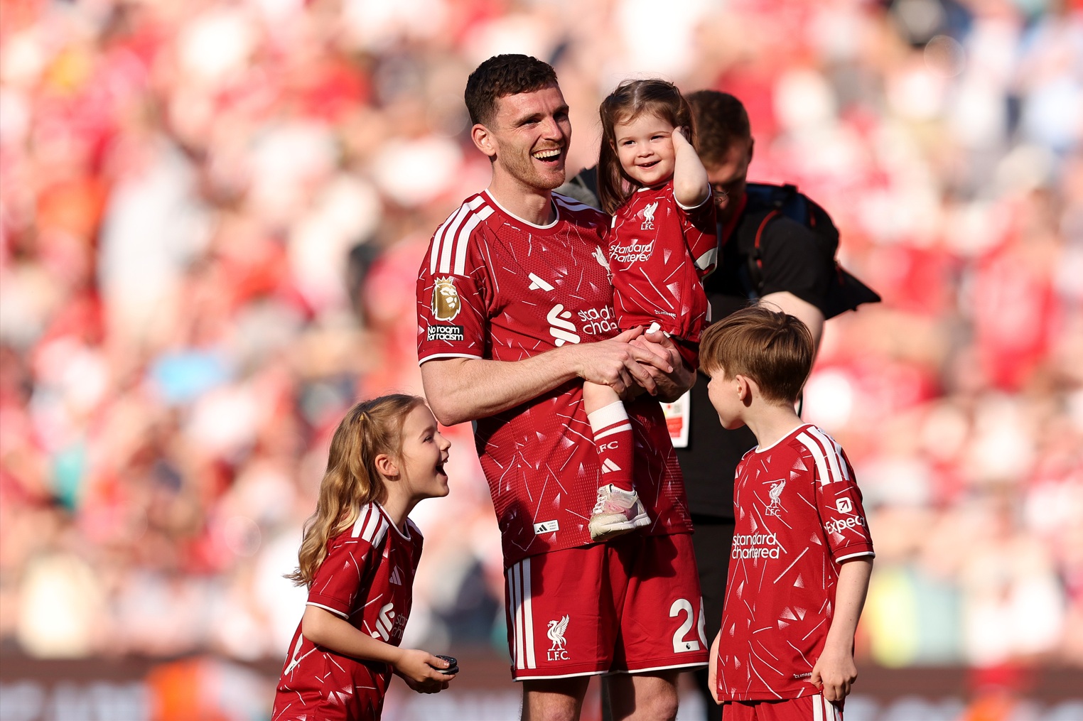 Andy Robertson enjoys a moment with his family after his final match for Liverpool