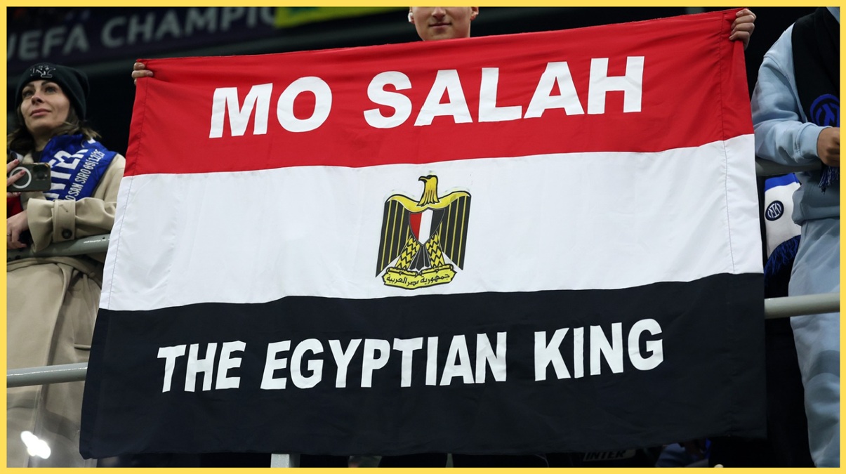 A supporter holds up an Egypt flag in admiration of Mo Salah