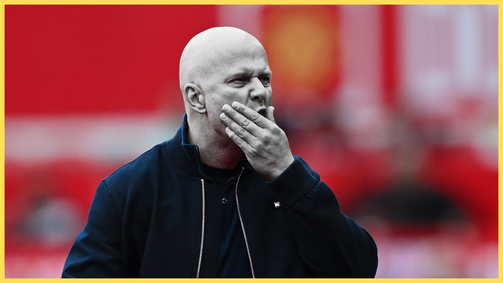 Former Liverpool manager Arne Slot rubs his face in frustration.