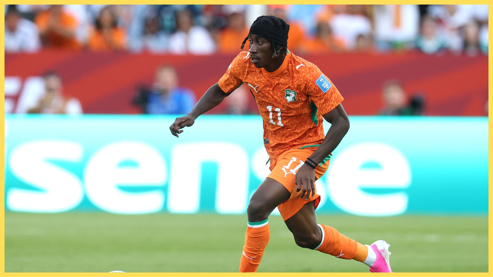 Liverpool target Yan Diomande dribbles with the ball.