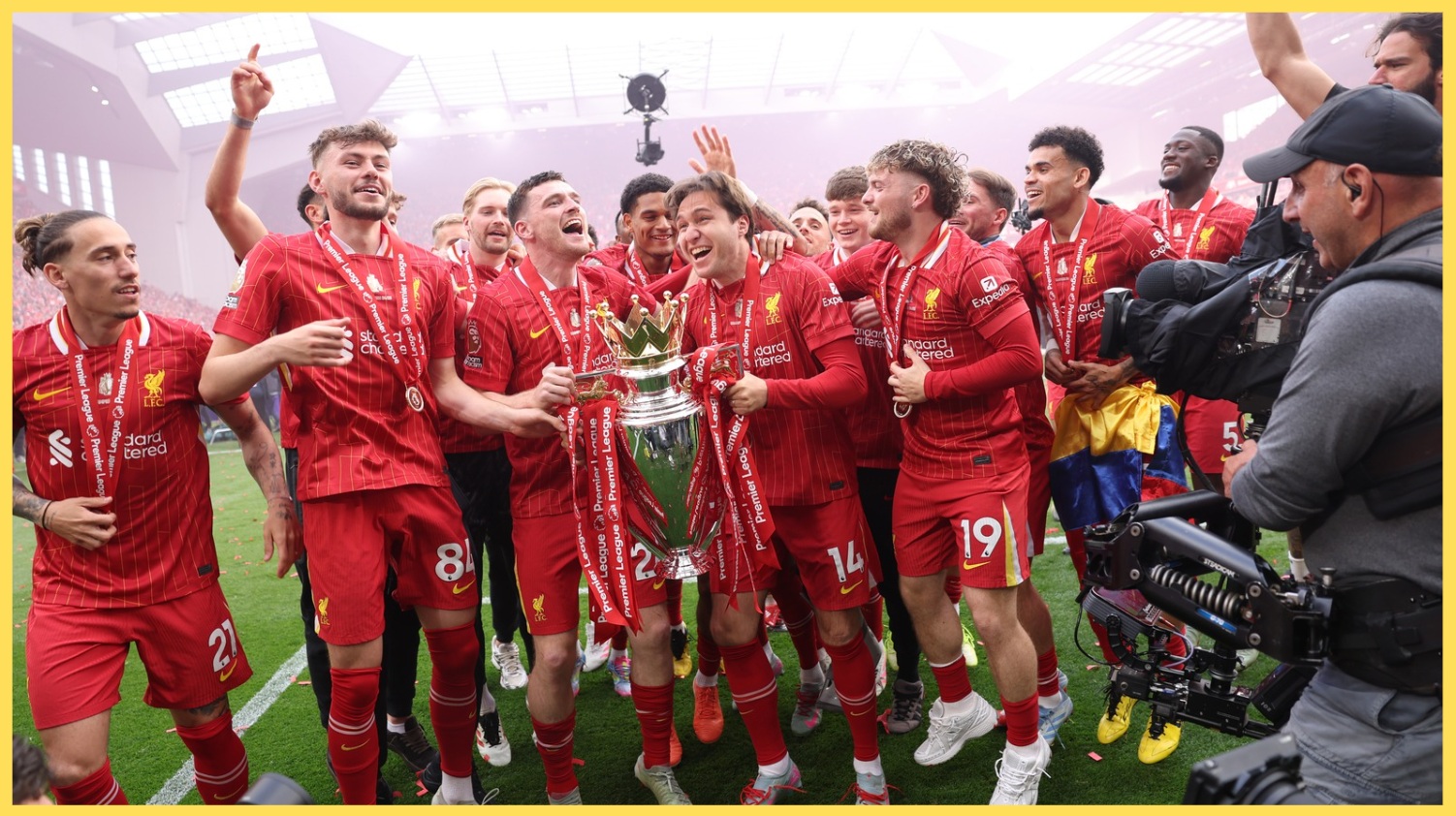 Federico Chiesa holds the Premier League trophy during Liverpool's title-winning celebrations in 2025