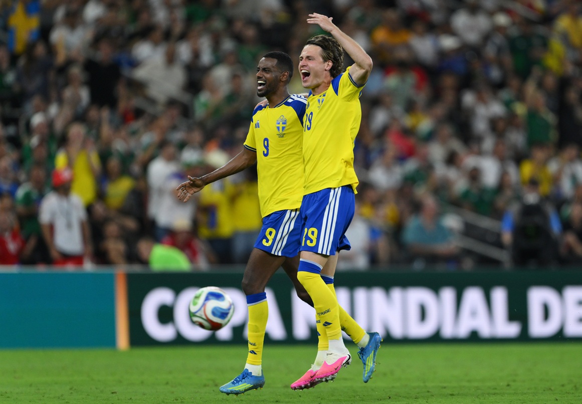 Alexander Isak celebrates with Matias Svanberg during Sweden's 5-1 drubbing of Tunisia