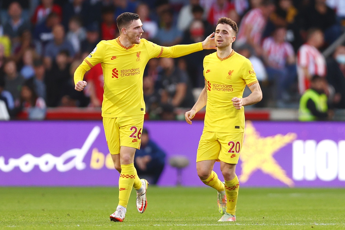 Andy Robertson and Diogo Jota celebrate a goal for Liverpool in 2021