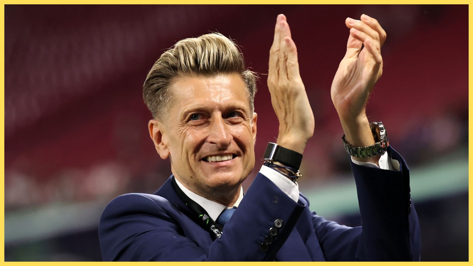 Crystal Palace chairman Steve Parish enthusiastically claps his hands.