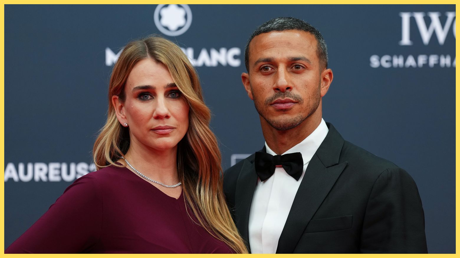 Former Liverpool midfielder Thiago Alcantara embraces his wife Julia Vigas.