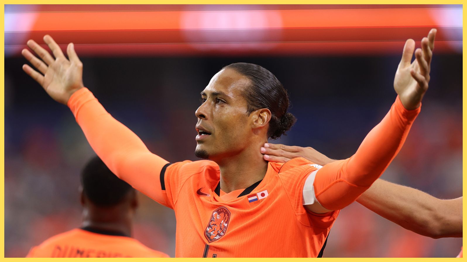 Liverpool centre-back Virgil van Dijk holds his arms out wide during Netherlands game.