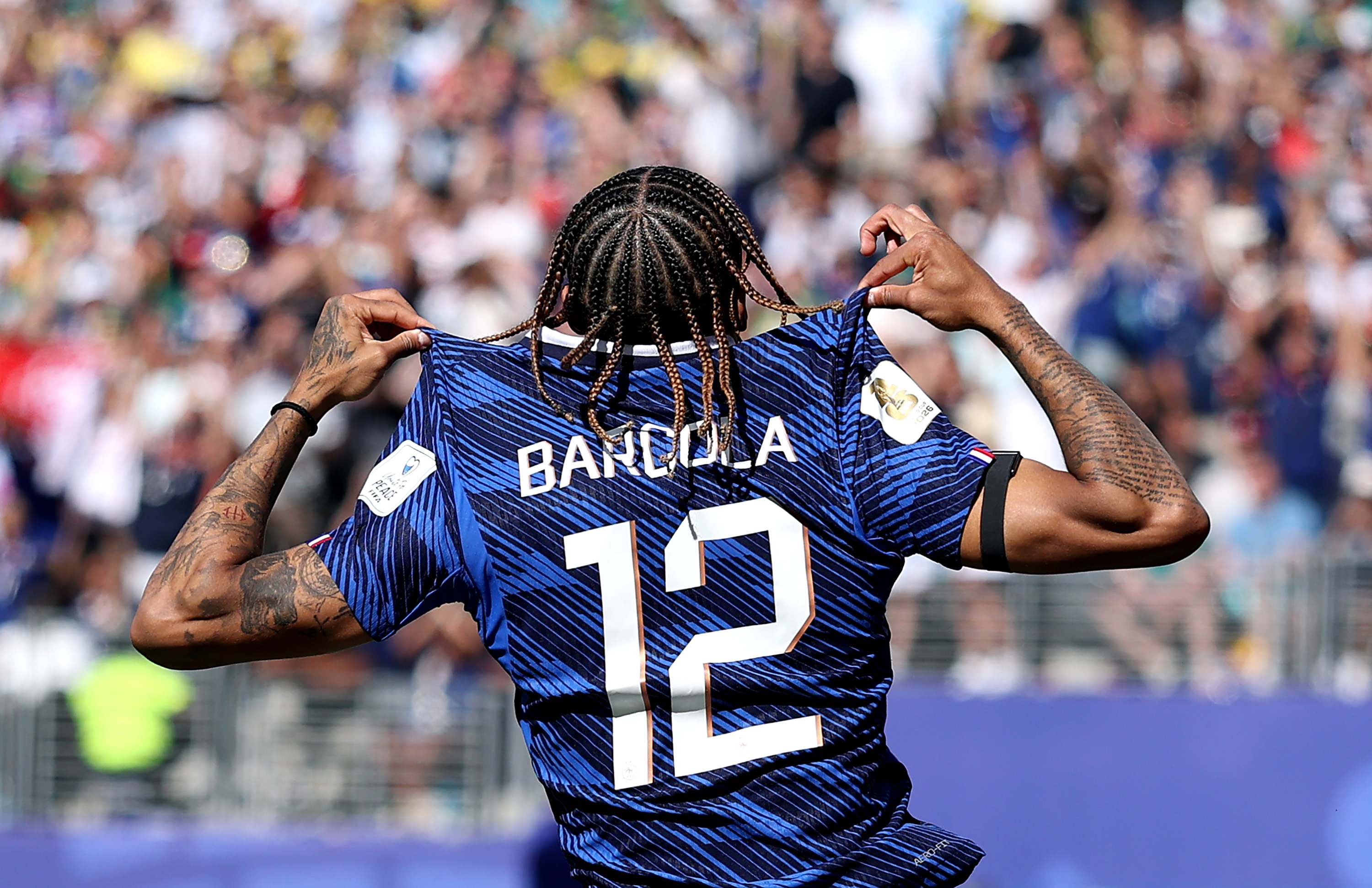 Bradley Barcola celebrates after scoring for France at the World Cup