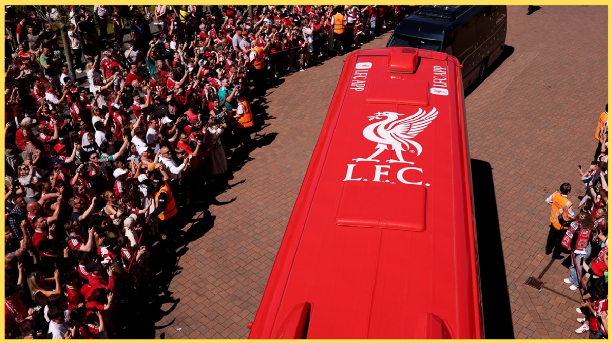 Liverpool's team bus is greeted by fans outside Anfield