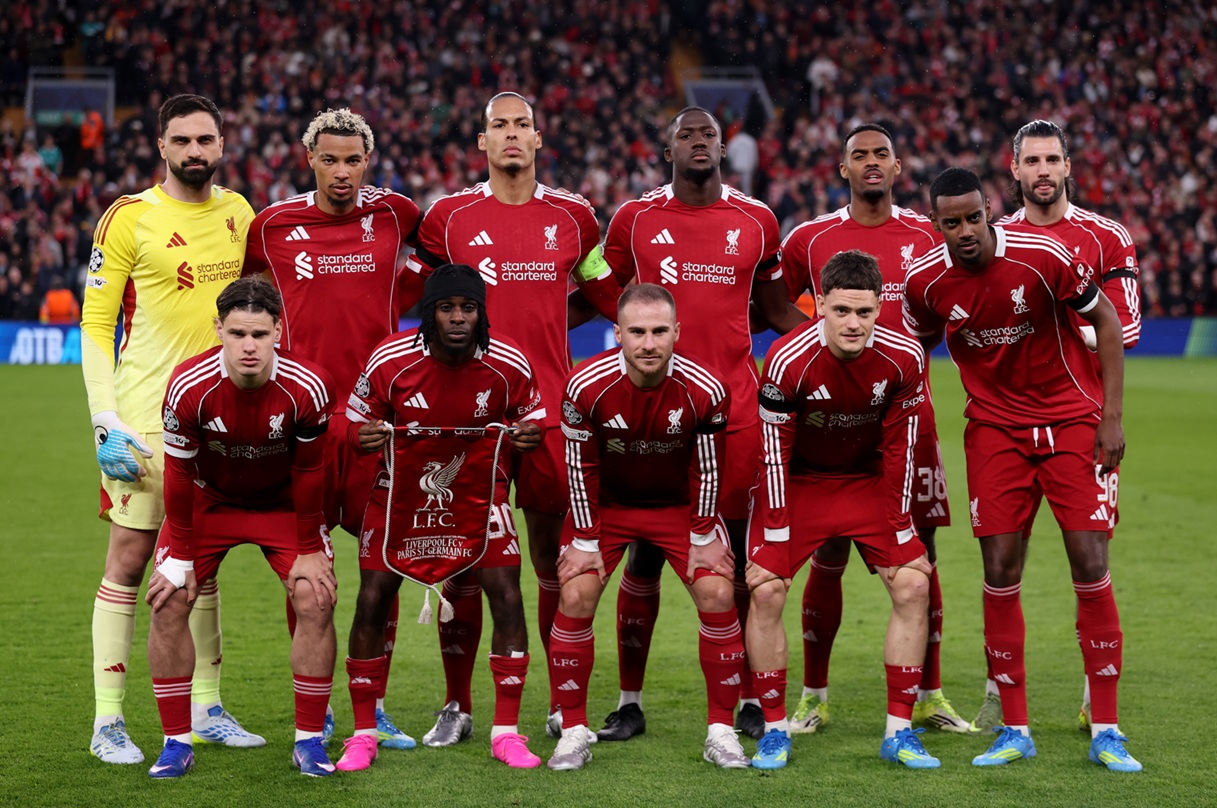 Liverpool players pose for a team photo before a Champions League match