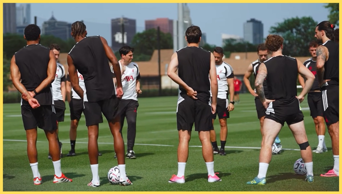 Andoni Iraola speaks to his Liverpool players during a training session